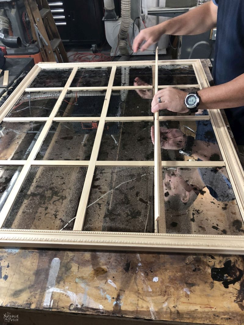 fitting the pieces for a diy antiqued panel mirror