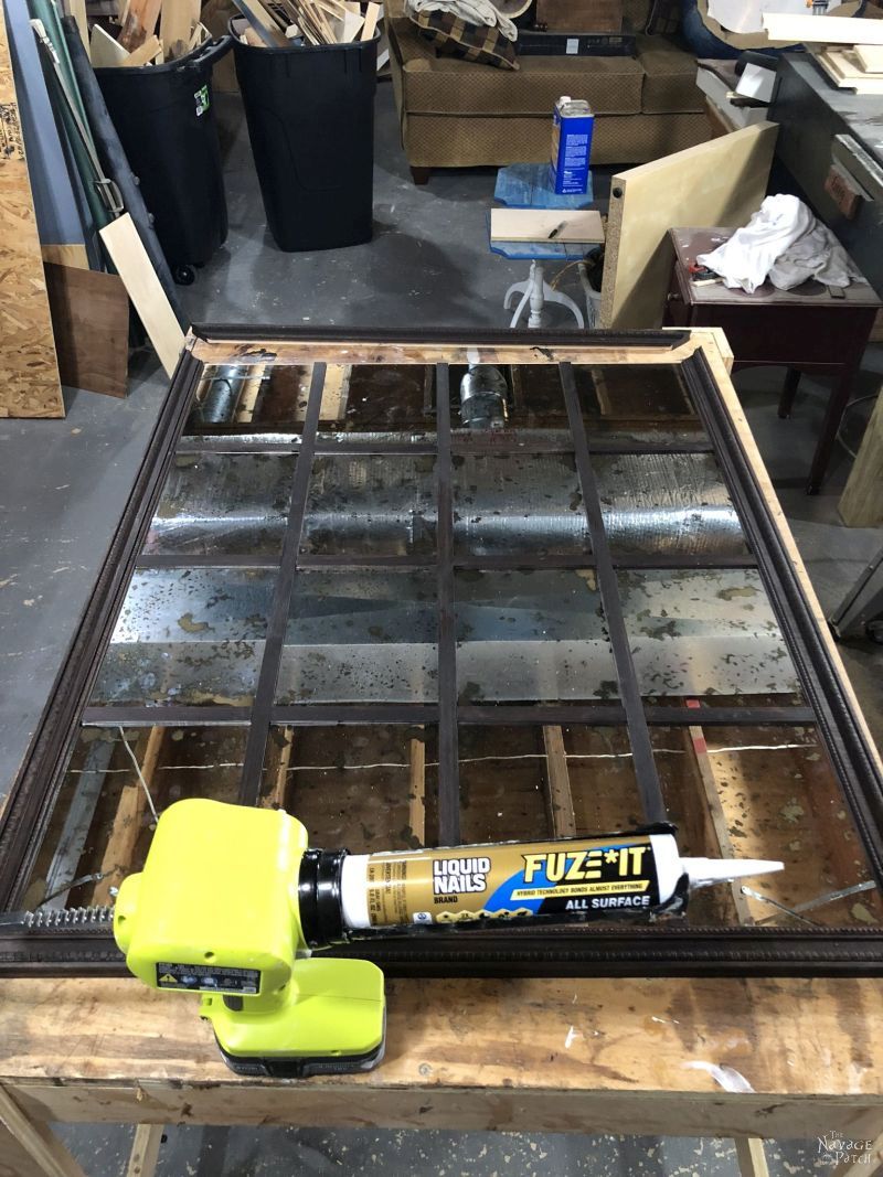 using construction adhesive to build a diy antiqued panel mirror