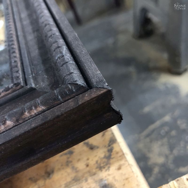 corner of a diy antiqued panel mirror