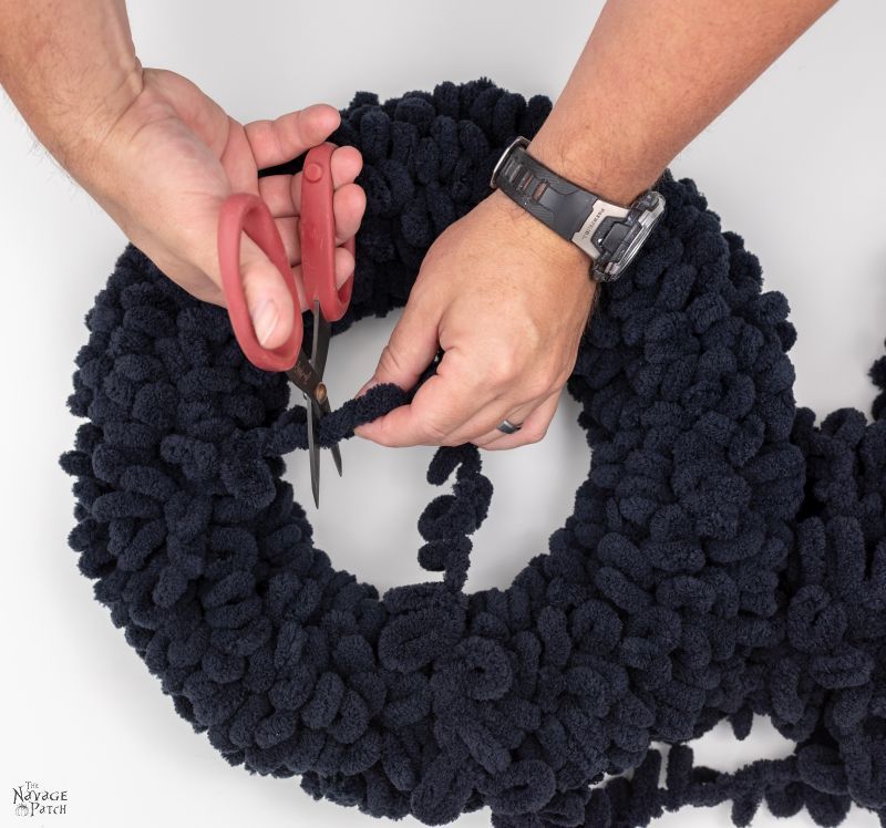 cutting loop yarn on a wreath