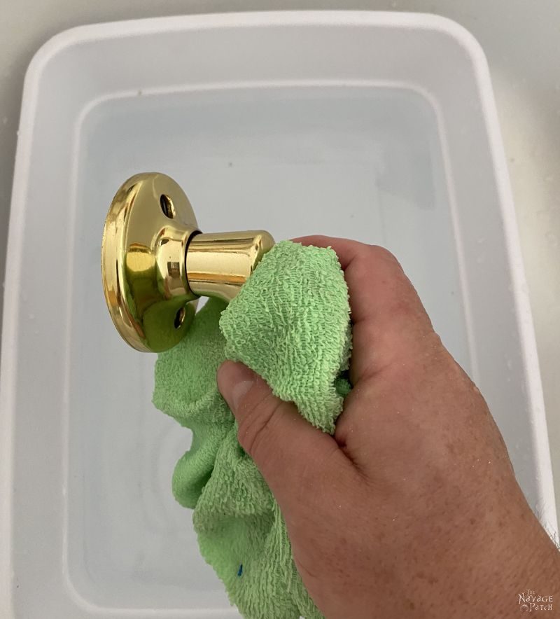 cleaning a door handle with TSP