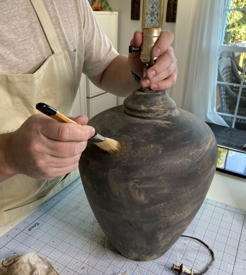 mud painting a lamp