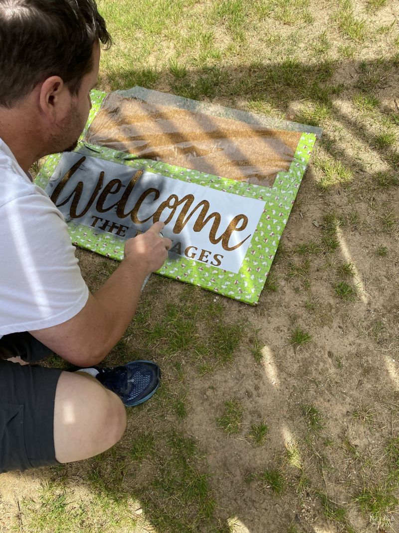 spraying a mat