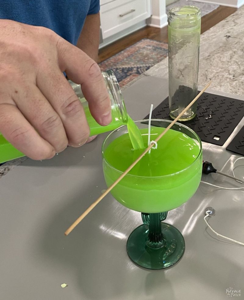 pouring liquid wax into a glass