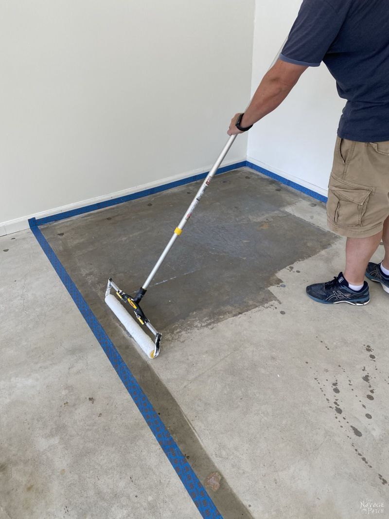 applying primer to concrete before painting