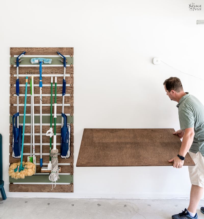 man opening a folding table