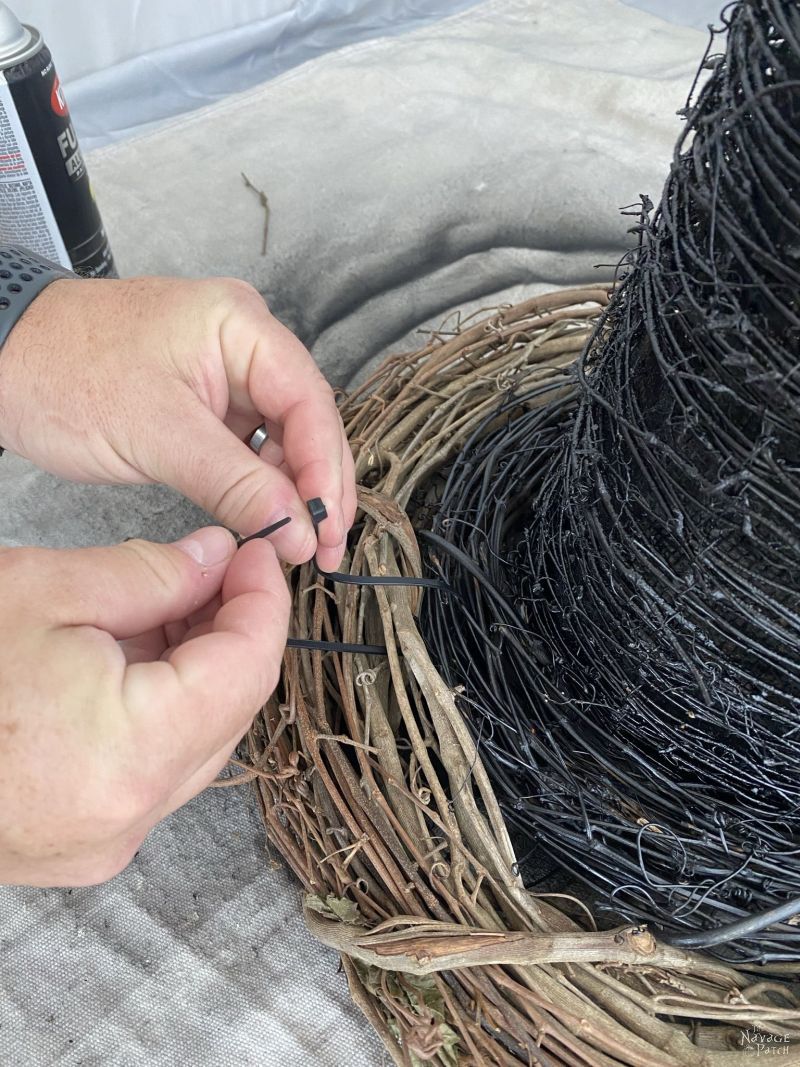 zip tying two grapevine wreaths together