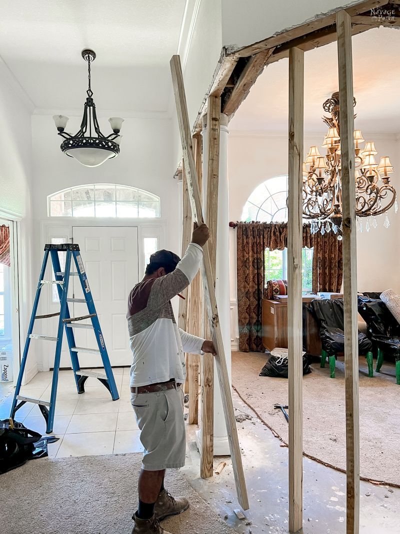 man installing wall supports