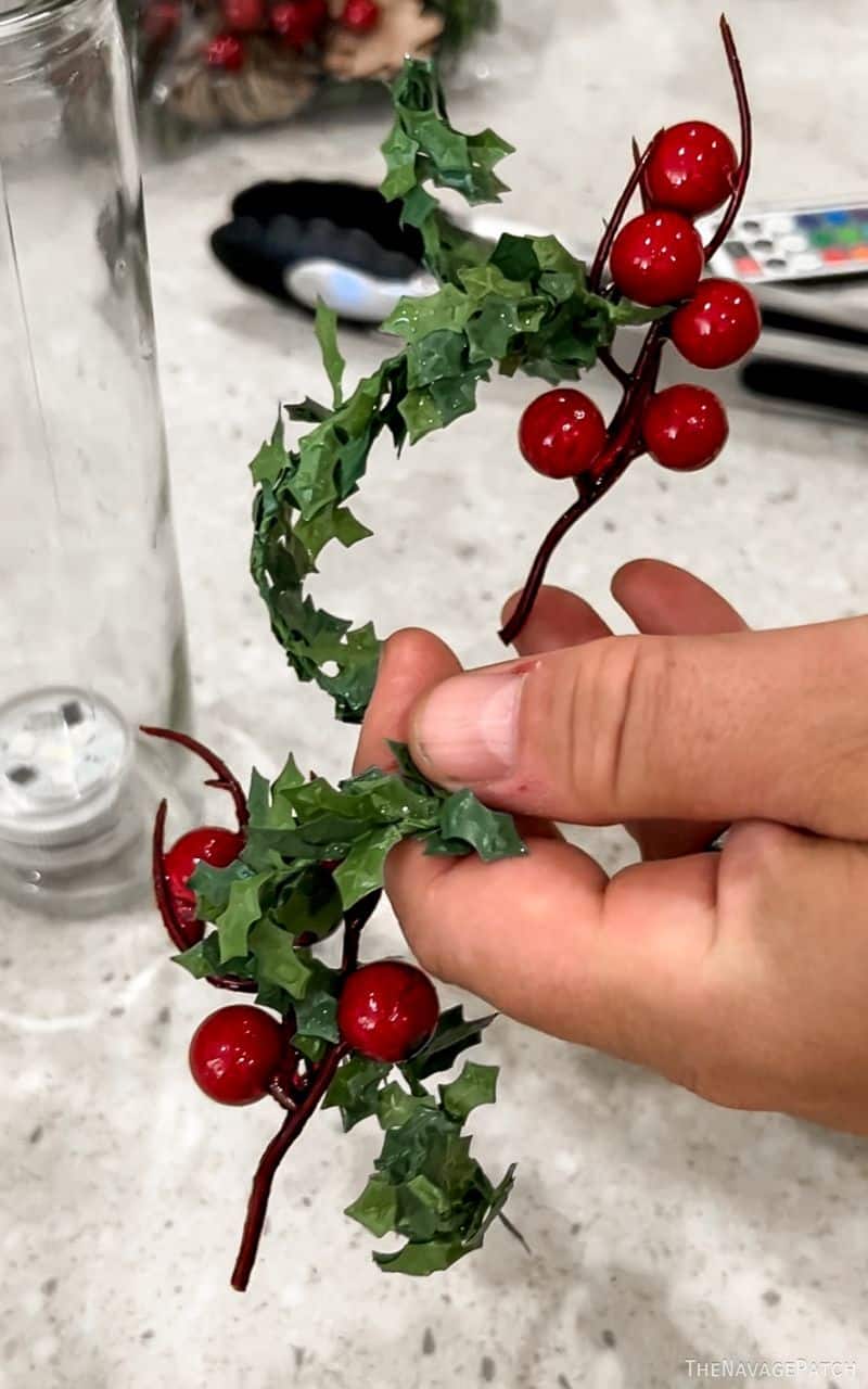 man making floating christmas candles