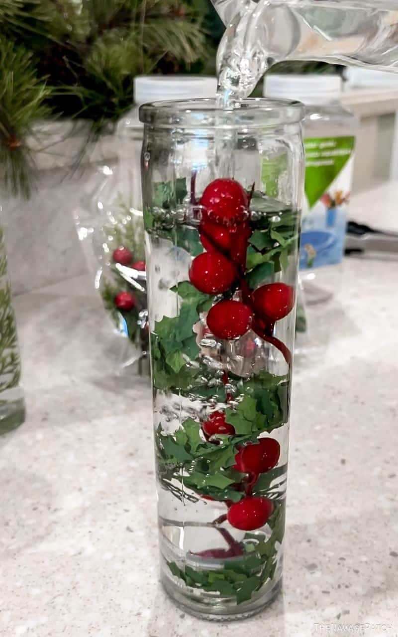 man making floating christmas candles