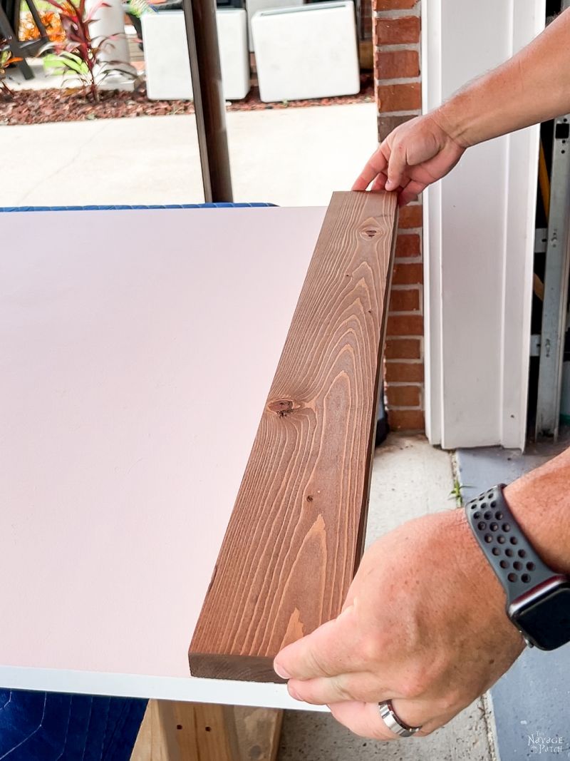 man making a modern sliding barn door