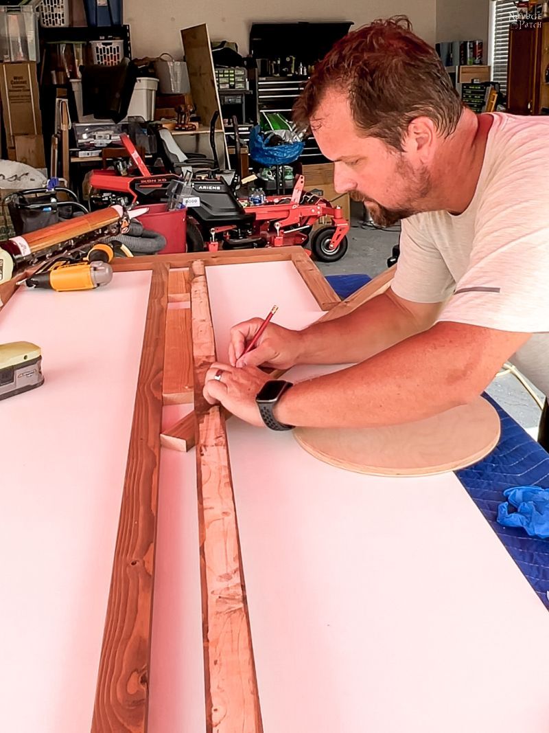 man making a diy modern sliding barn door