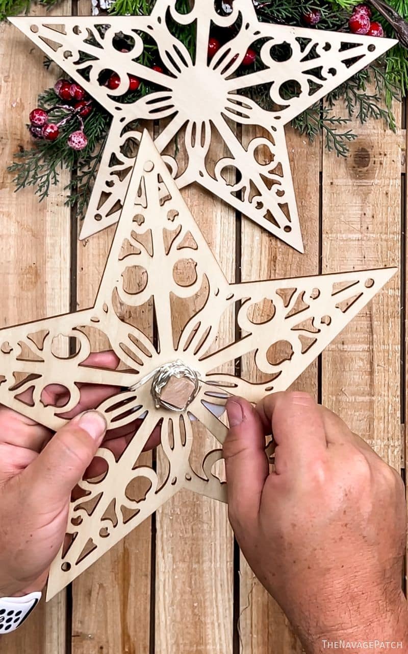 man making light-up stars