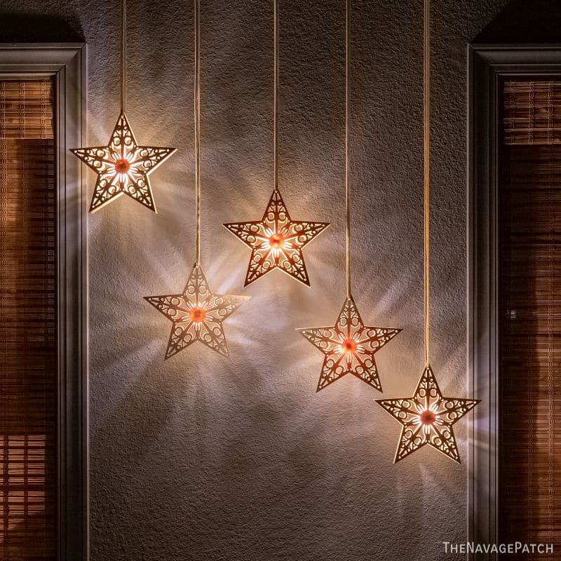 DIY Dollar Tree Light-Up Wood Stars by TheNavagePatch.com