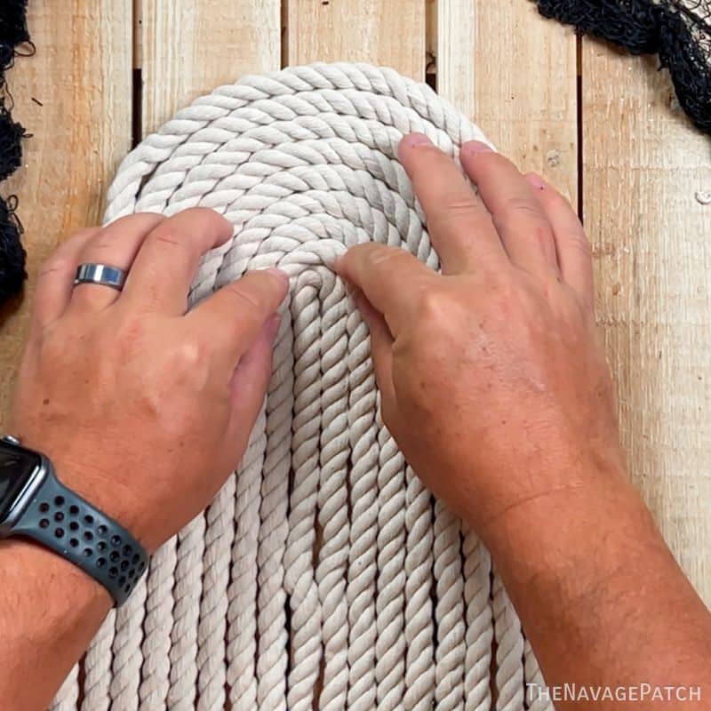 man making a macrame ghost