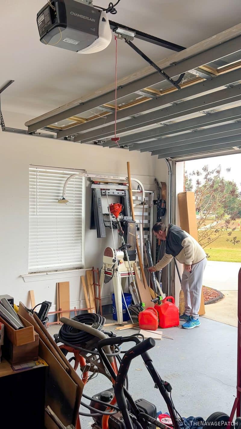 man clearing a garage