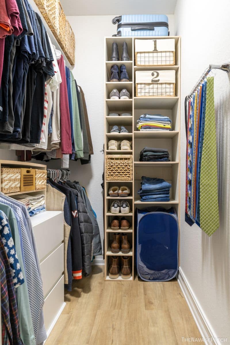 Large Walk In Closet With Tile Floor, Also Including Many Shelves