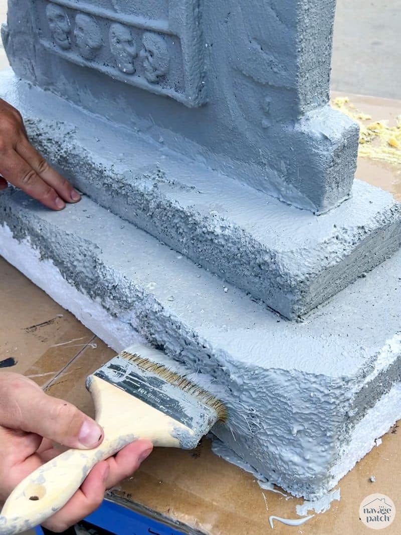 painting diy tombstones with drylok