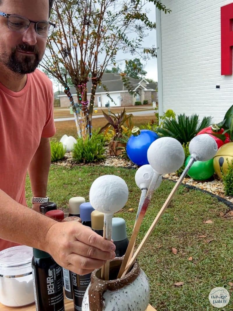 man making diy faux velvet ornaments