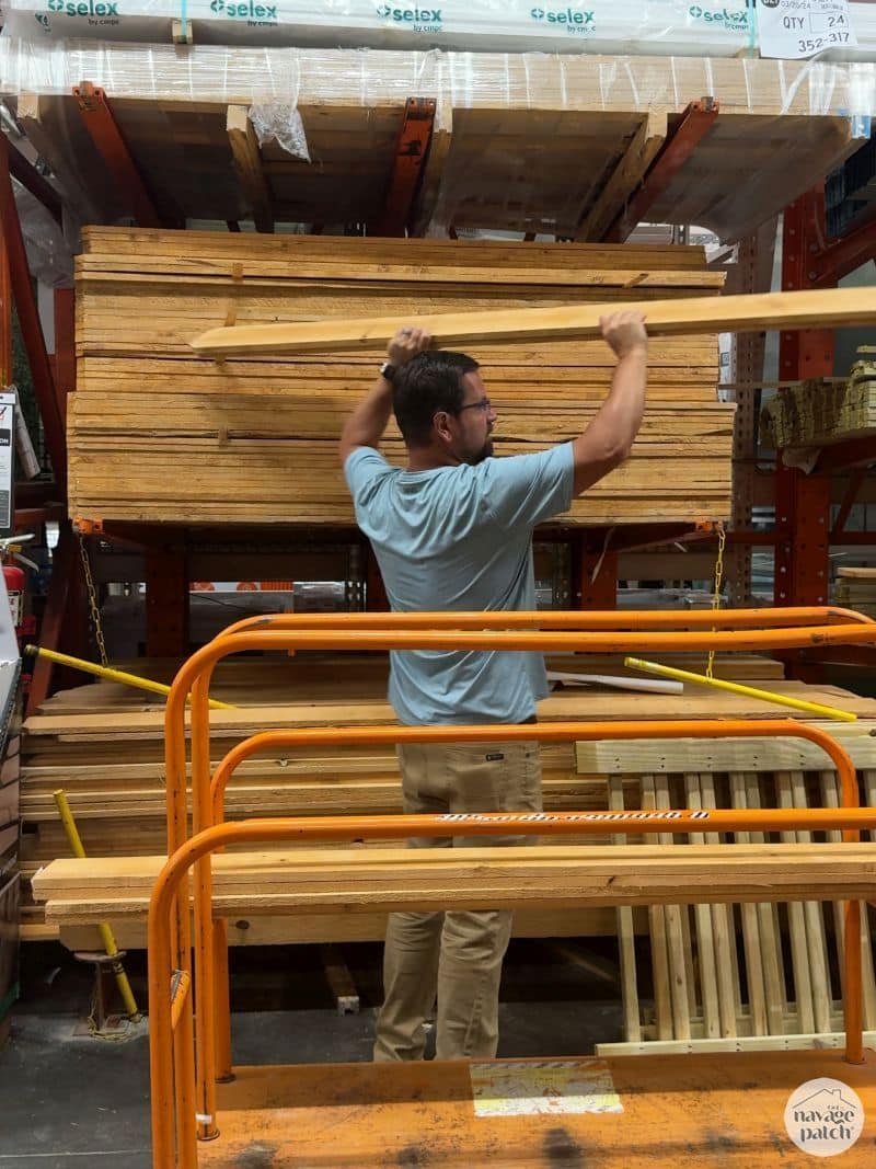 man buying wood