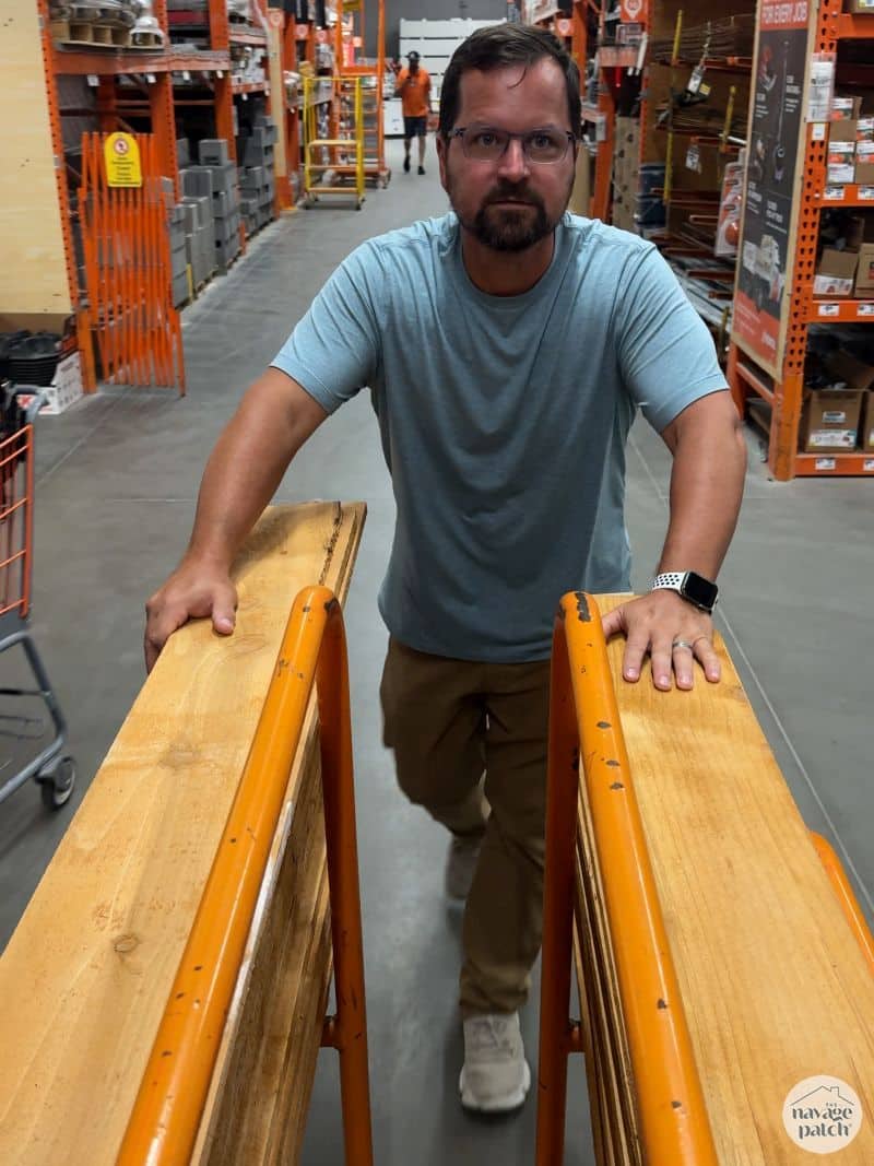 man buying wood