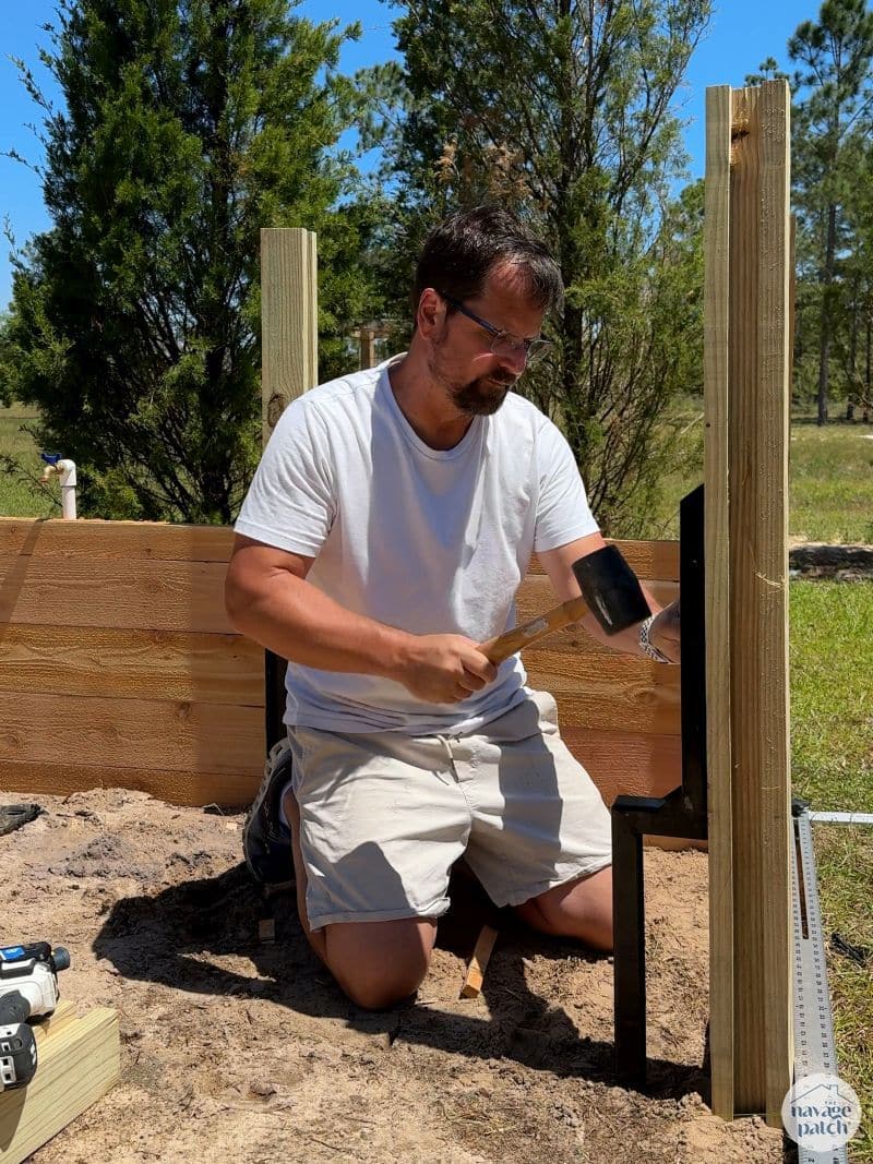 man making a raised garden bed