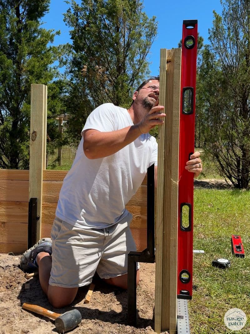 man making a raised garden bed