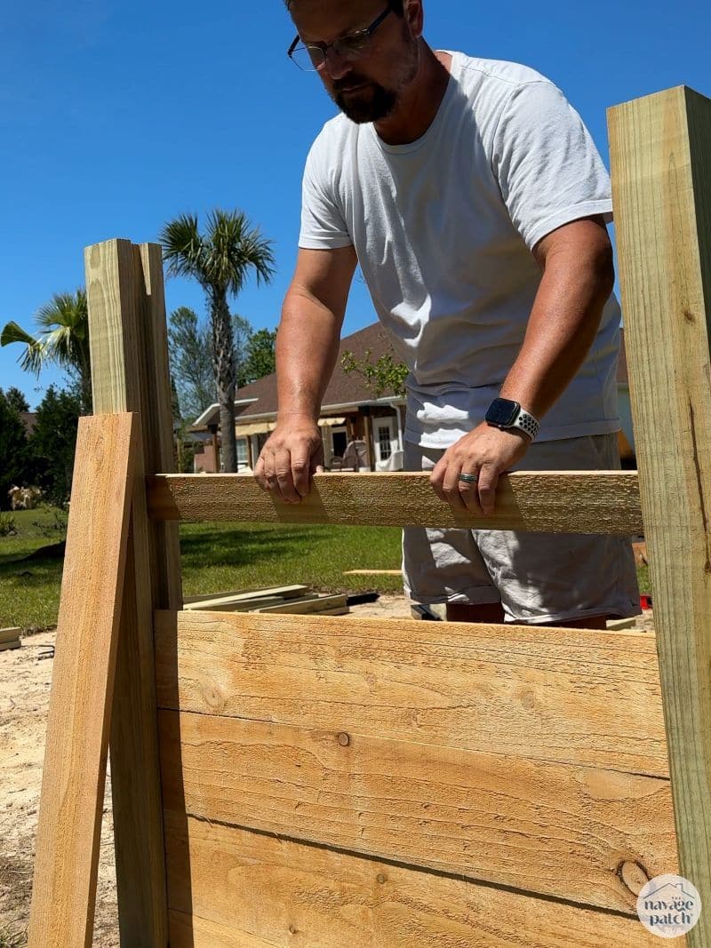 man making a raised garden bed