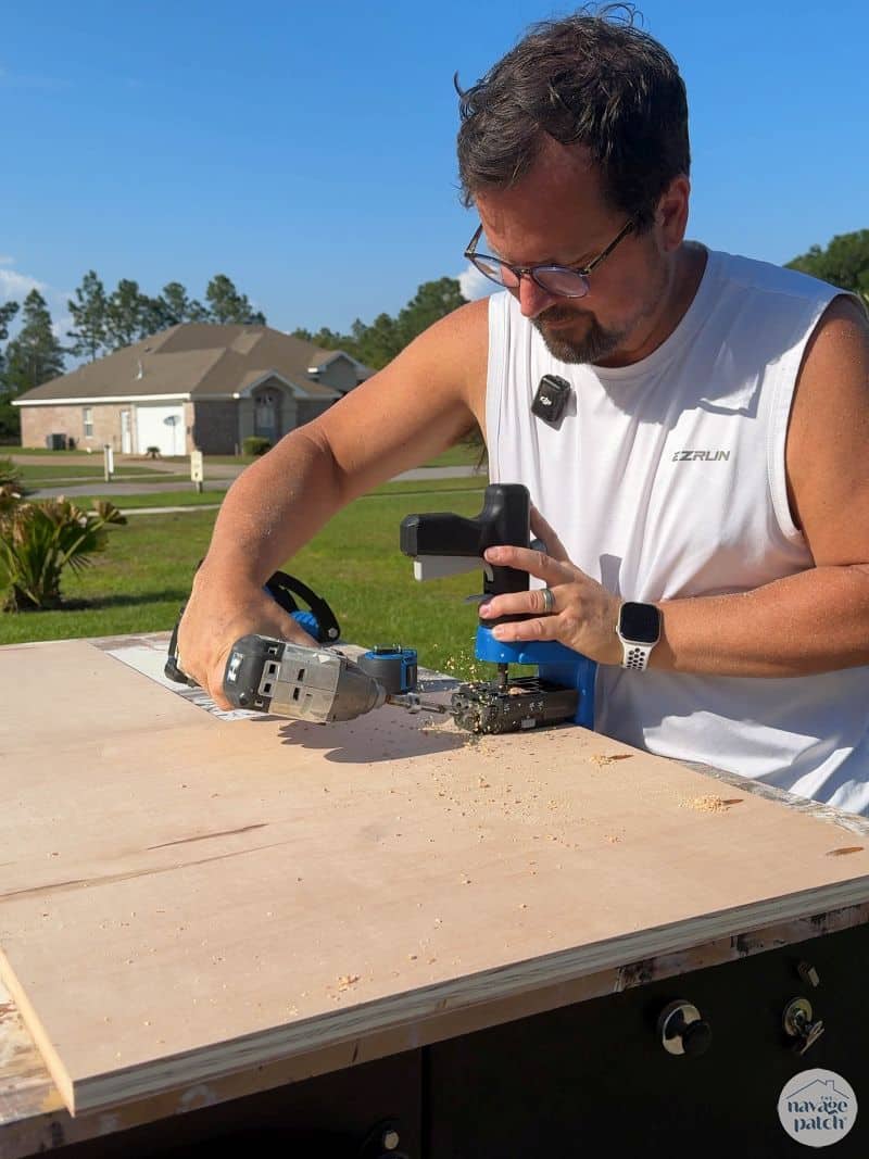 man drilling pocket holes