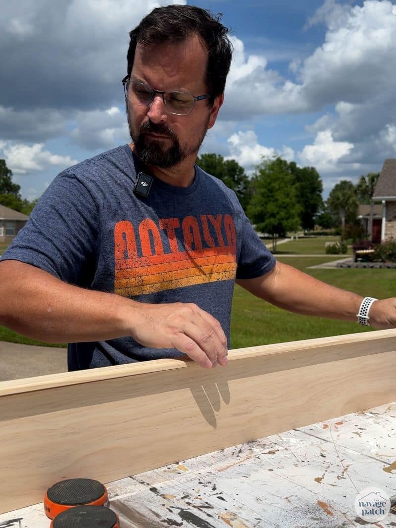 man building a shelf