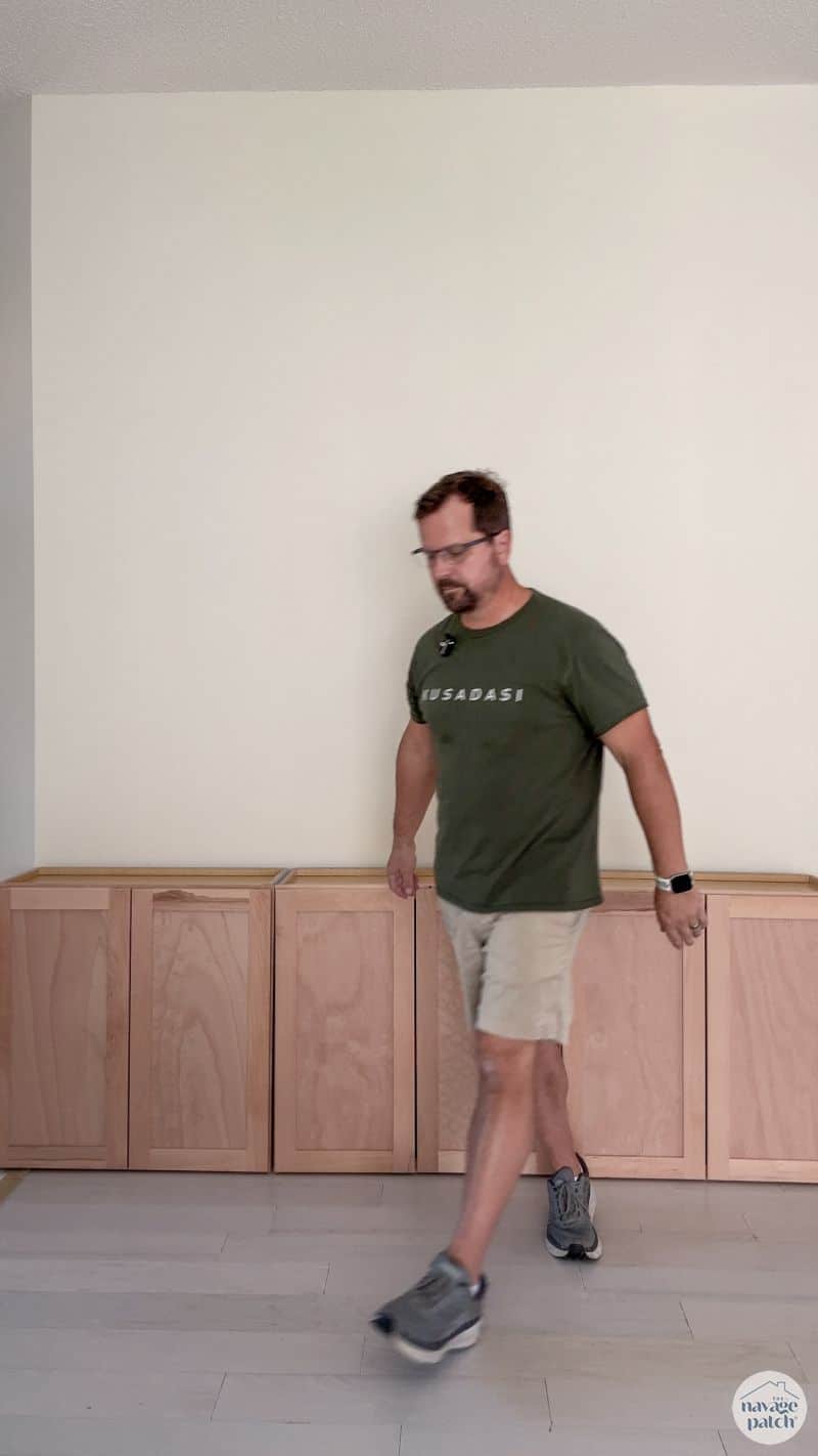 three cabinets against a wall