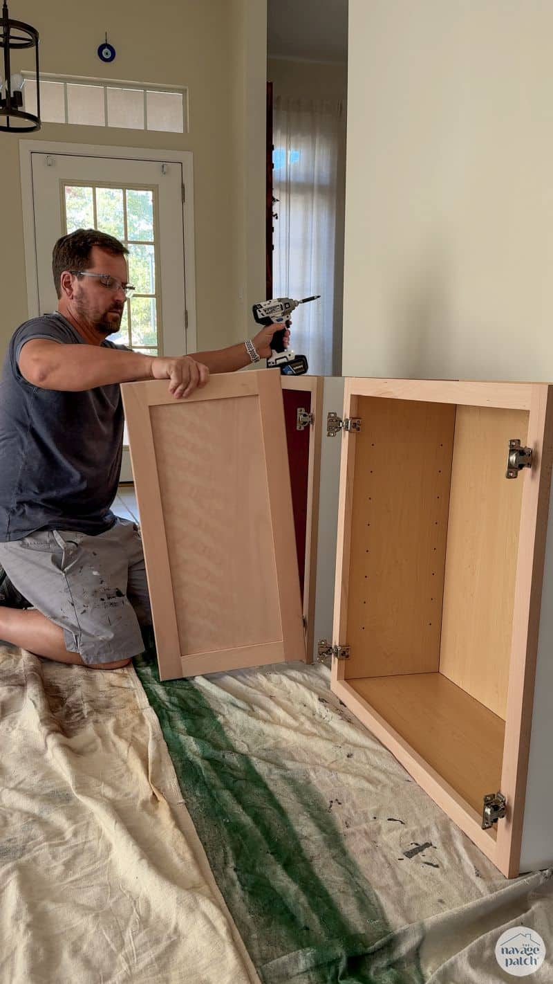 man removing cabinet doors